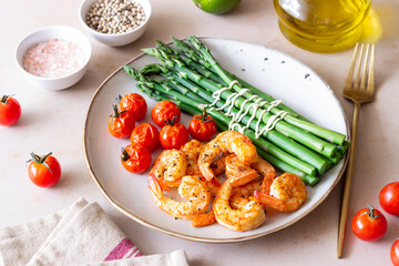 Fried shrimp with asparagus and tomatoes. Healthy eating. Diet.