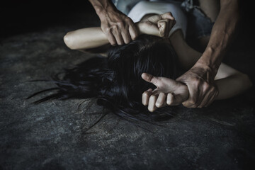 Close up of man hands holding a woman hands for rape and sexual abuse concept, Wound domestic violence rape, sexual assault, stop violence against women, human trafficking. - obrazy, fototapety, plakaty