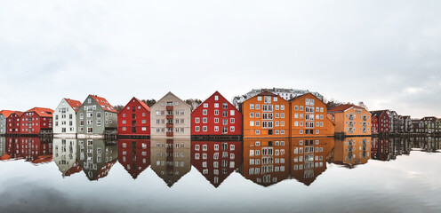 Fototapeta premium Colorful historic timber storehouses in Trondheim, Norway in winter