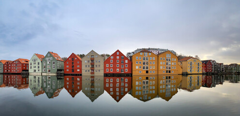 Fototapeta premium Colorful historic timber storehouses in Trondheim, Norway in winter