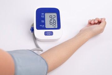 Close up digital blood-pressure meter for health monitor, heart rate check. healthcare and medical concept. The concept of hypertension and the elderly and health care