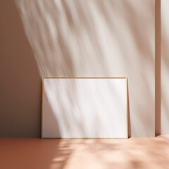 Poster photo frame mockup leanings against the pastel wall on the floor with leaves shadow