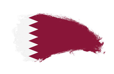National flag of Qatar painted with stroke brush on isolated white