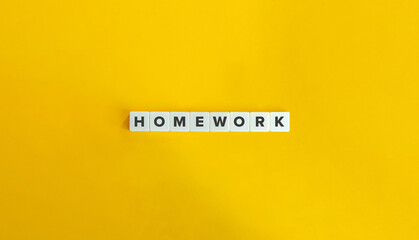 Homework Work on Block Letter Tiles on Yellow Background. Minimal Aesthetic.