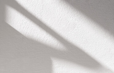 Shadow overlay on grey cement wall texture.Abstract Sunlight reflection from window on white...