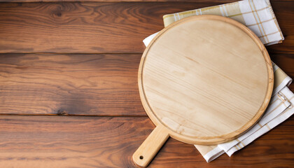 Napkin and board for pizza on wooden desk mockup. Selective focus. - obrazy, fototapety, plakaty