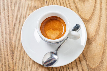cup of coffee on the wooden table