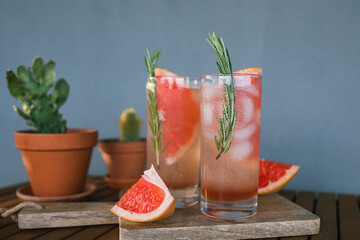 Sparkling cocktails pink Paloma in tall glasses.