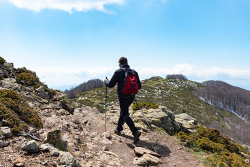 Fototapeta premium Man walking on a mountain trail. Montseny mountains, Catalonia, Spain.