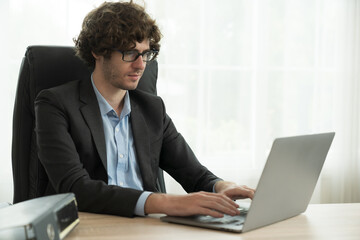 Businessman working with computer laptop in office. Business people and office concept