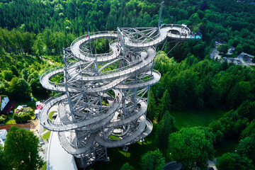 Sky Walk observation tower in Sweradow Zdroj, Poland. Tourist attraction in montains, aerial view....