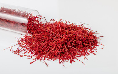Saffron: A vibrant and highly valued spice derived from the crimson threads of the Crocus sativus flower. Its brilliant red-orange color and delicate form reflect its rarity and allure. Renowned for i
