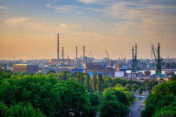 Cranes of the shipyard in Gdansk at sunset, Poland