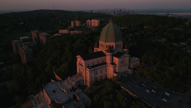 drone shot over saint joseph oratory at Sunset in Montreal quebec canada during summer