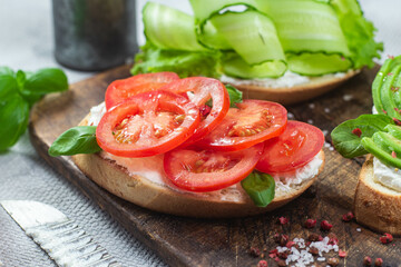 Sandwiches with tomato, avocado and cucumber