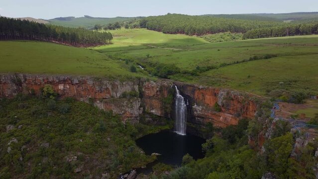 South Africa aerial drone Lisbon Berlin Falls waterfalls Sabie cinematic Kruger National Park partially cloudy lush spring summer green stunning river landscape bush slowly up movement