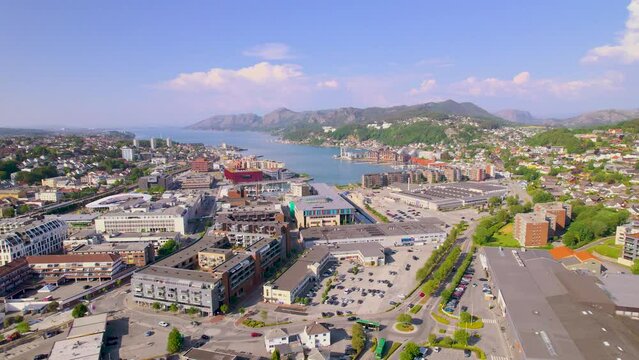 Panning drone footage of Sandnes City, Gandsfjord and mountains in Rogaland Norway