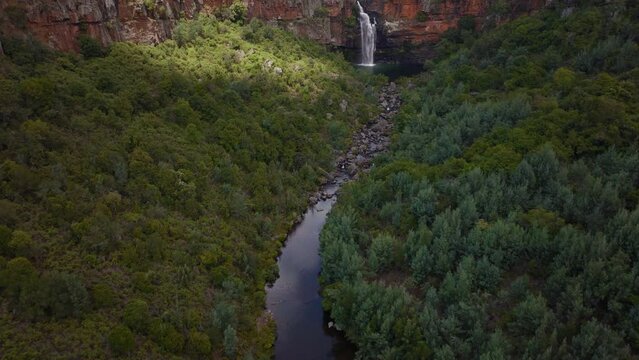 South Africa aerial drone Lisbon Berlin Falls waterfalls Sabie cinematic Kruger National Park partially cloudy lush spring summer green stunning river landscape bush slowly forward pan up movement