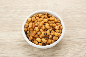 Marning, heap of crispy roasted corn kernels, traditional snack from Indonesia
