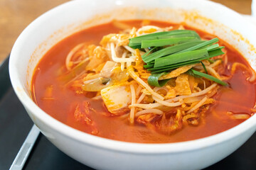 Delicious jjamppong, jjambbong, Chinese-style Korean noodle soup topped with spicy seafood and kimchi broth in South Korea.