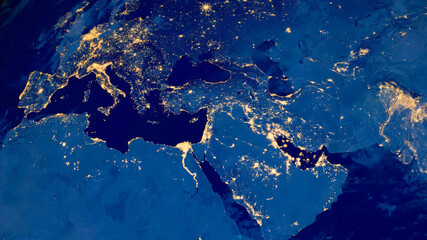 Fototapeta na wymiar Earth photo at night, World map. Satellite photo. City Lights of Europe, Middle East from space. Elements of this image furnished by NASA.