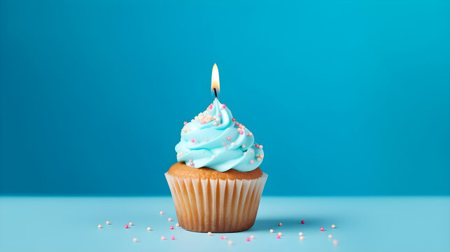 cupcake with candles on blue background created with Generative AI