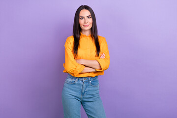 Photo of cheerful gorgeous girl with straight hairdo dressed yellow shirt standing arms crossed isolated on purple color background