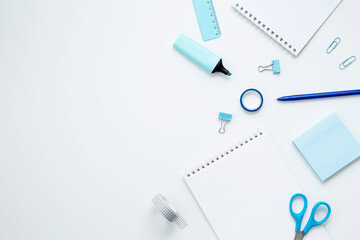 Mockup notebooks and set of stationery for work and study on white background. Back to school. Top view, flat lay, copy space