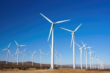 Fototapeta premium wind farm with turbines spinning in the wind on a clear blue sky, created with generative ai