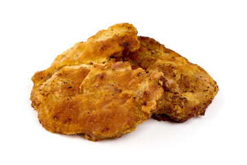 Homemade breaded chicken Wiener schnitzel, isolated on white background.