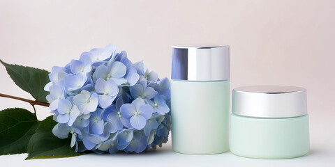 Obraz na płótnie Canvas Cosmetic ad template. Close up of Blue Hydrangea or hortensia mockup with packaging, cosmetic bottle, jar. Flower blossom composition.Top view, flat lay.Generative ai