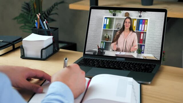 Woman tutor in computer screen talk teaches student remote webinar course lesson, distance education. Man at home office study online video call webcam chat laptop listen teacher, writes in notebook