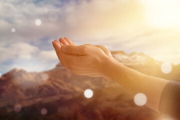 Hands of a prayed person for hope from God