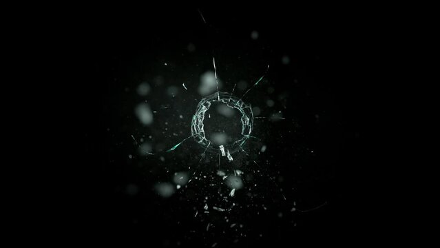 Super Slow Motion Shot of Real Bullet Glass Break Isolated on Black Background at 1000fps.