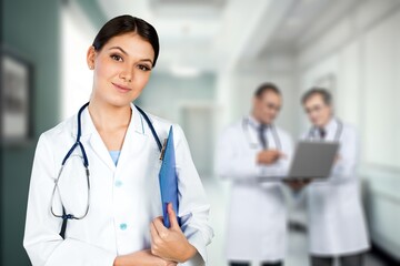 Fototapeta premium Cute young nurse at medical staff meeting.