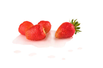 4 ripe strawberries berries isolate in water, reflection. Natural from the garden. Strawberry with root, leaves