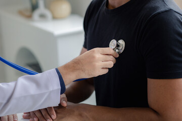 The doctor and the patient are discussing the details of the treatment, the results of the physical examination of the patient. Annual physical examination concept.