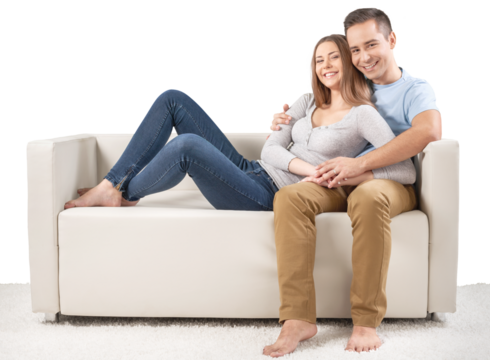 Smiling Couple on the Couch - Powered by Adobe