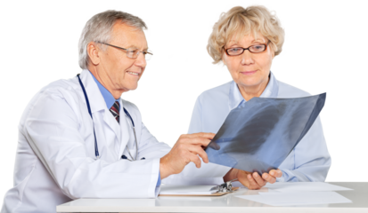Portrait of a Mature Doctor with Patient Showing a Radiograph