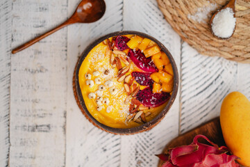 Mango Fruit Smoothie Bowl in Coconut Shell Cup