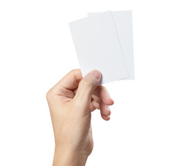 Hand holding two blank pieces of paper or plastic (tickets, flyers, invitations, coupons, banknotes, etc.), cut out