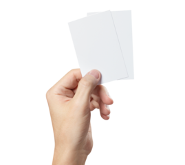 Hand holding two blank pieces of paper or plastic (tickets, flyers, invitations, coupons, banknotes, etc.), cut out