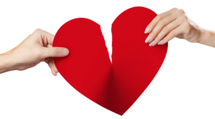 Male and female hands tearing a red heart symbol of love in half, cut out