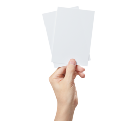 Hand holding two blank sheets of paper (tickets, flyers, invitations, coupons, banknotes, etc.), cut out