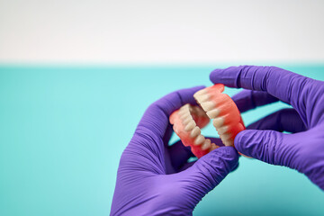 Prosthodontics Holding A Denture