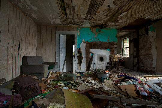 Debris and decay in an abandoned house; Digby Neck, Nova Scotia, Canada