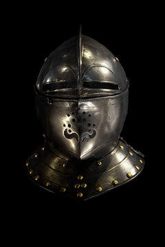 Medieval helmet on a black background, Muiden Castle; Muiden, Netherlands