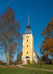 Fototapeta na wymiar Mežotne Lutheran Church in Latvia at suny day