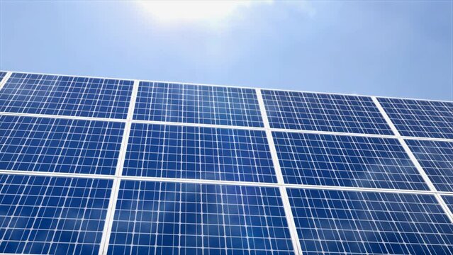 4K video of solar panels generating electricity with sunlight, technology, and clean energy animation on blue sky