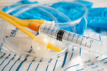 Foley urinary catheter with urine bag for disability or patient in hospital.